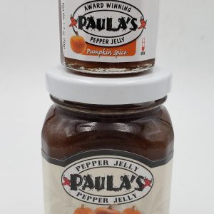 1.7 oz. pumpkin spread jar atop the 8 oz. Paula’s Pumpkin Pepper Jelly from Paula’s Pepper Jelly.